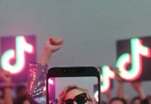 Latest Celebrity TikTok Trends Everyone’s Talking About a celebrity in oversized sunglasses mid-lip-sync with dramatic flair, a smartphone screen exploding with viral dance notifications,